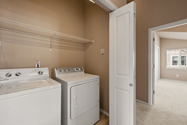 Building Photo - 4BR + Den Greenwood Home with Private Suite & 2-Car Garage