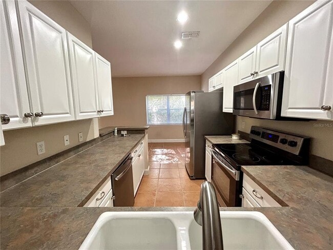 Building Photo - 6211 Ashbury Palms Dr