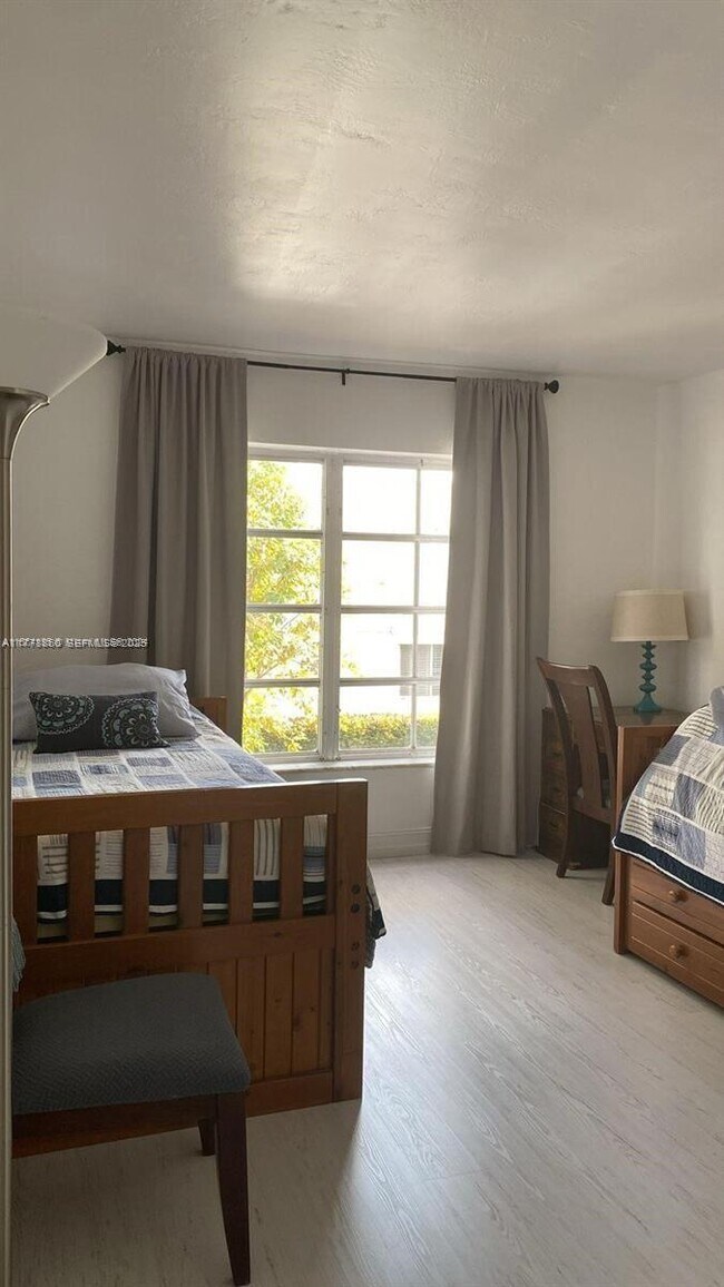 Building Photo - 10150 Collins Ave