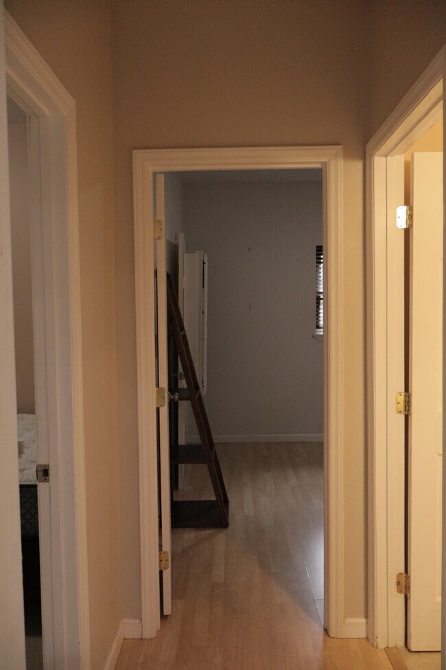 Building Photo - Expansive Mostly-Furnished Residence featuring 3 Bedrooms, a Completed Basement, and a Loft Space