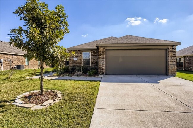 Building Photo - This well-maintained 4 bedroom home is located in a quiet neighborhood that has a community park ...