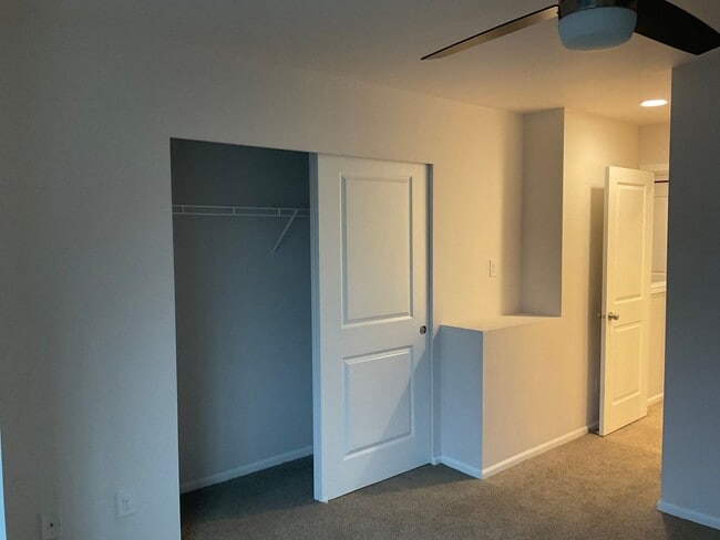 Building Photo - Riverfront Townhome with Tandem Garage & Fenced Yard