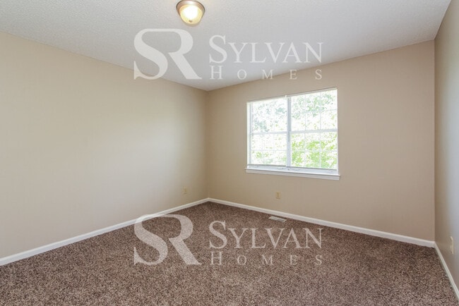 Building Photo - The living is easy in this 3 bedroom, 2 bathroom home