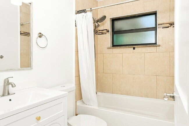 Building Photo - Fully Renovated 3/2 Near Manasota Beach with a Sunroom and a Big Backyard