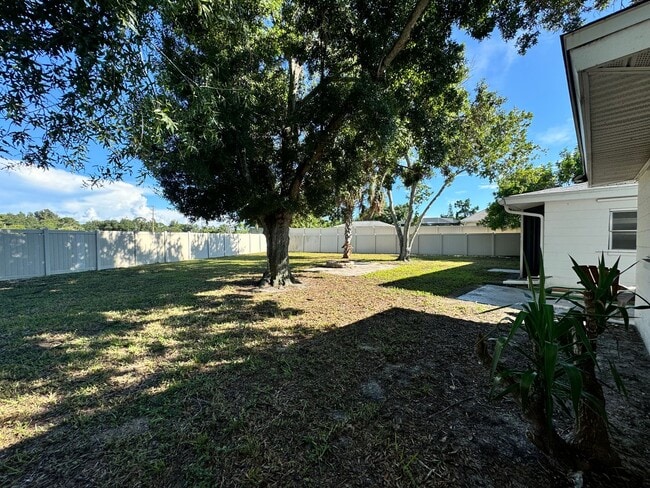 Building Photo - 2/2 with Fenced Yard, Garage and Laundry, Available Now!