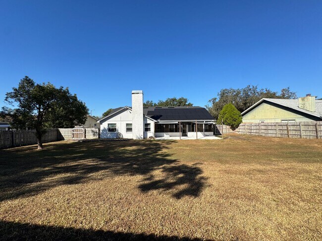 Building Photo - Your Dream Home Awaits! MASSIVE Backyard! ...