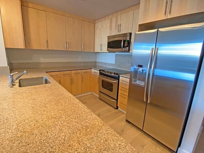Building Photo - Live at The Axis High-Rise! Upscale, Urban...