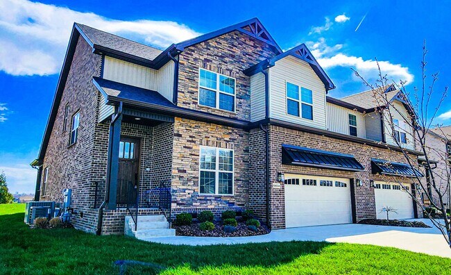 Primary Photo - Elegant All-Brick Townhome in a Gated Comm...