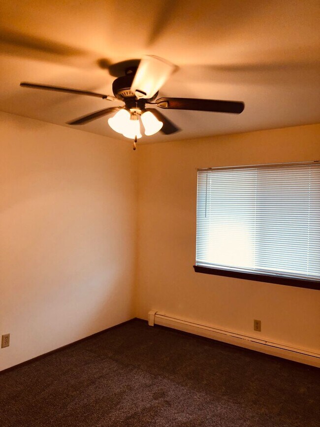 Building Photo - Spruce Court Apartment - Greenfield WI - Call 262-420-0390 to schedule a showing