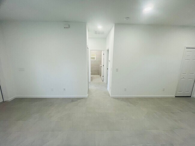 Building Photo - Brand-New Modern 2BR/2BA Home with Garage on Oversized Lot – Prime SW Lehigh Acres Location