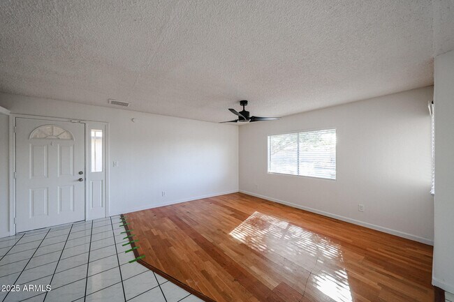 Building Photo - 3408 W Port Au Prince Ln