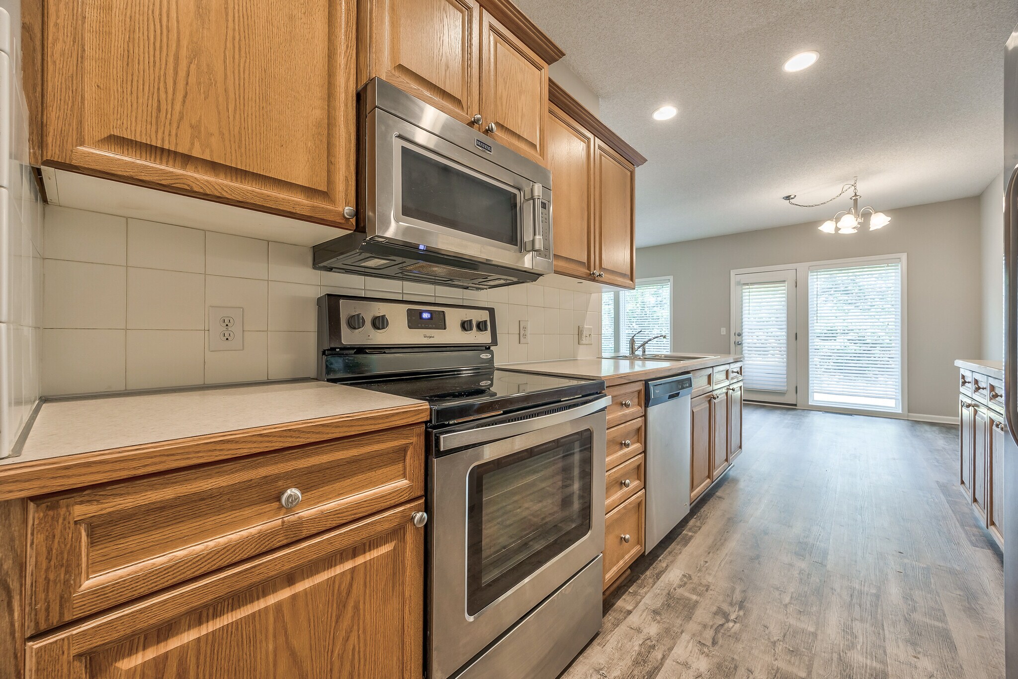 Kitchen stove and microwave - 22810 West 71st Terrace
