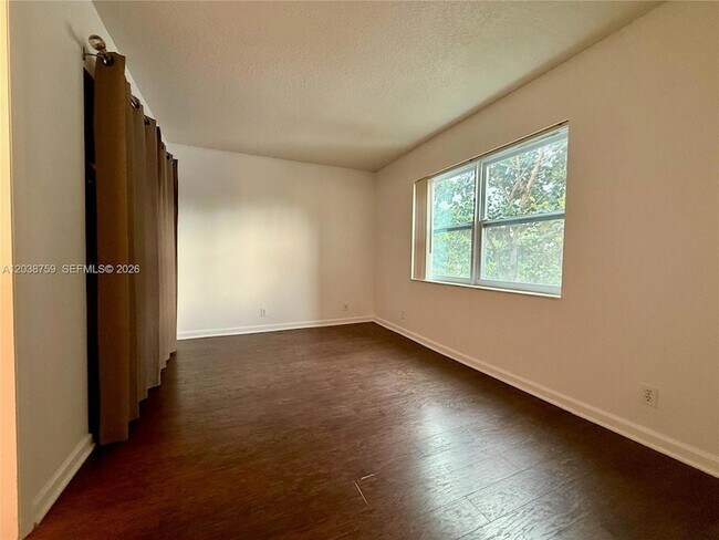 Building Photo - 3048 Sunrise Lakes Dr E