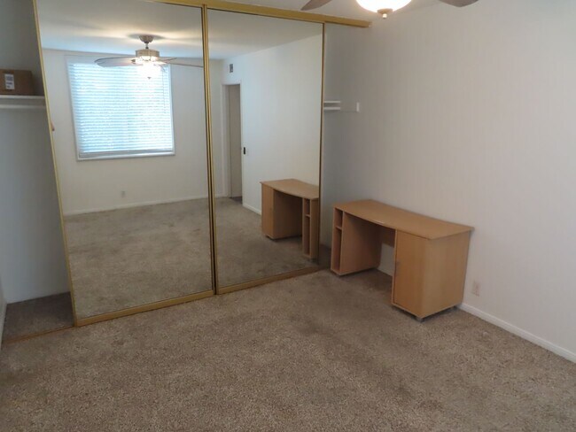 Building Photo - Partially Furnished Two Bedroom Condo in College Area