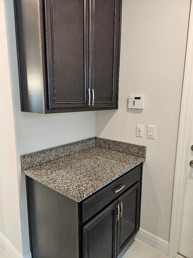 Building Photo - 9985 SW Trumpet Tree Cir