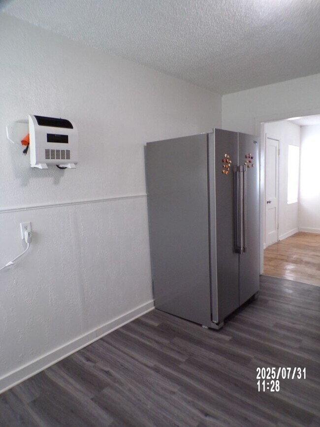 Building Photo - NEW listing-refinished hardwood floors, new laminate and paint throughout