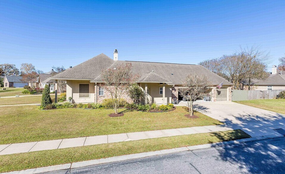 Exterior side with garage; corner lot - 10557 Sweetbrook Ave