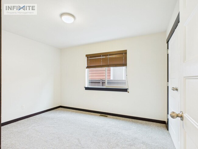 Building Photo - Single-Level 4BR with 3-Car Garage & Fence...