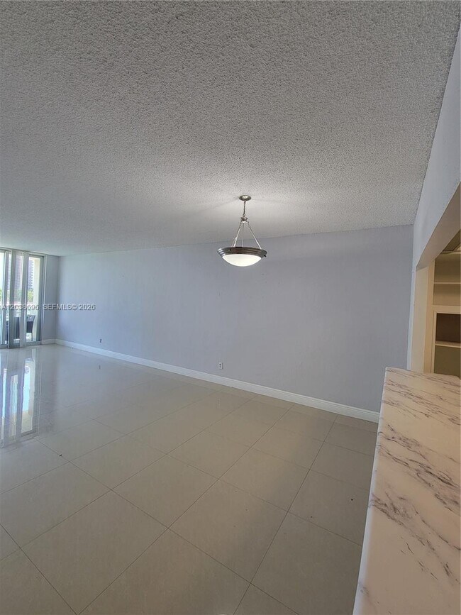 Building Photo - 19380 Collins Ave