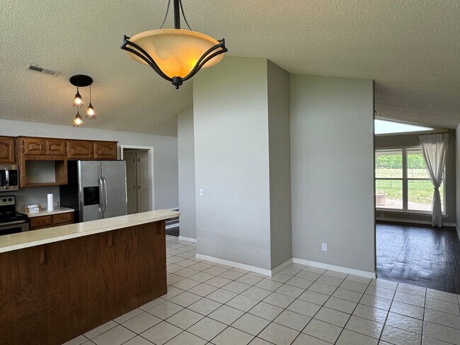 Building Photo - Available July 2025! 4-Bedroom, 2-Bathroom...