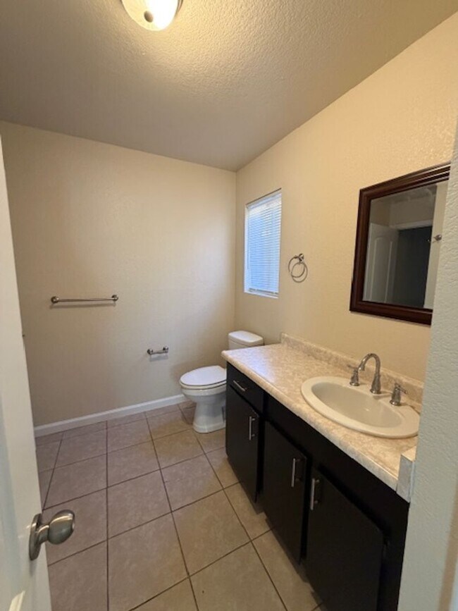 Building Photo - New Paint AND a Yard with a picket fence!