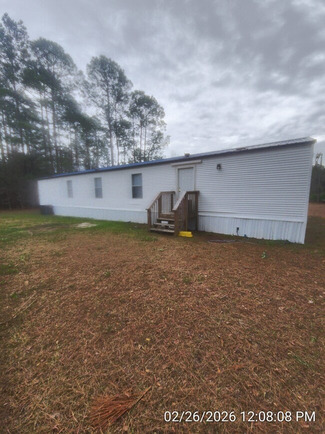 Building Photo - 19 Whispering Pines Cir