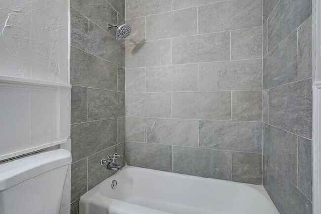 Building Photo - Beautifully Remodeled 3 or 4 bedroom with ...