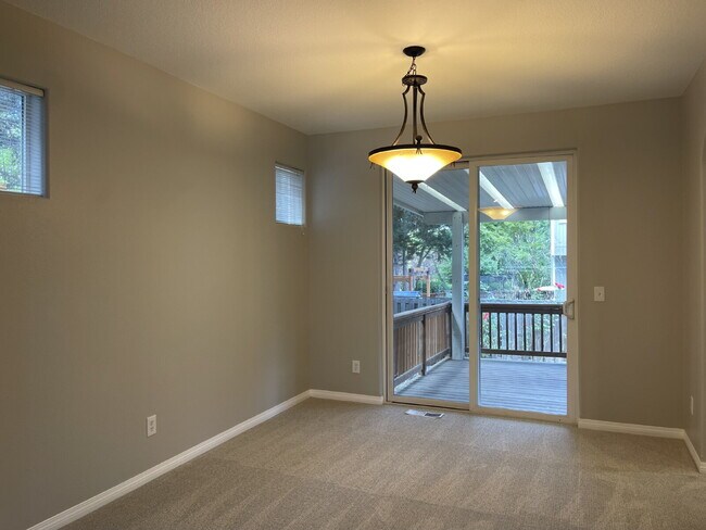 Building Photo - 4-Bedroom Happy Valley Home with Large Garage, Spacious Living Areas & Covered Deck