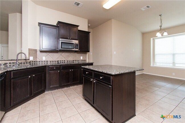 Building Photo - 7010 Cokui Dr
