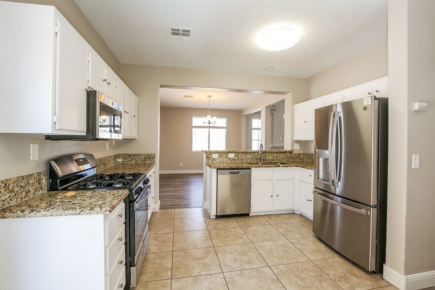 Building Photo - 5443 Goldenroot Ct