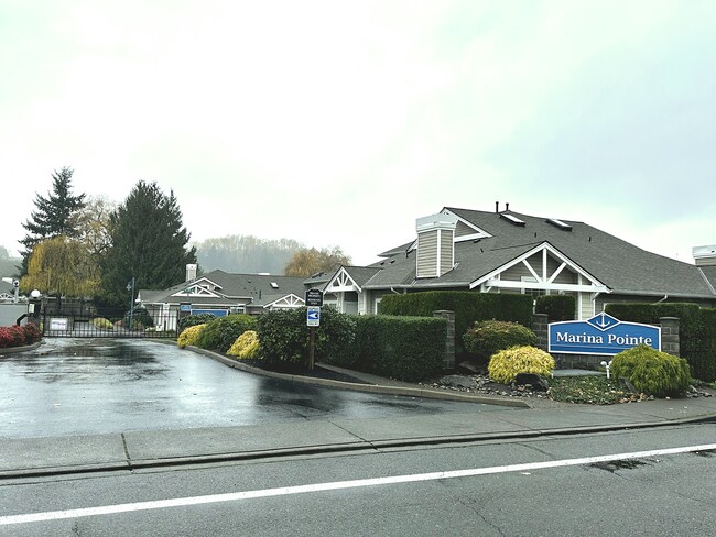 Building Photo - Elegant Gated Townhome with Main-Floor Primary Suite at Marina Pointe Kent