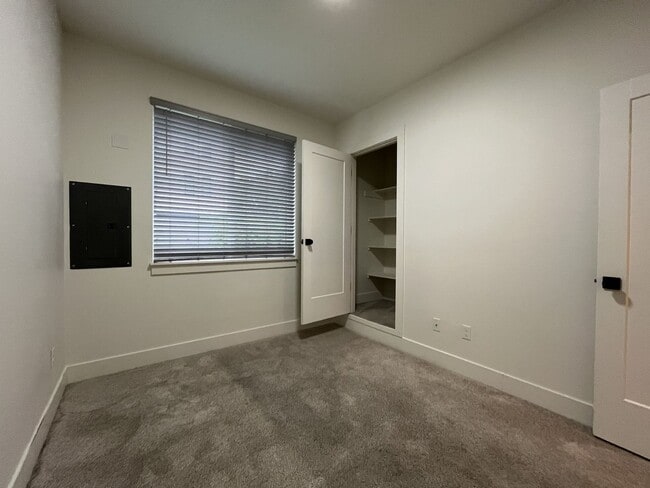 Building Photo - Modern 2-Bed, 1.5-Bath Condo with Custom Kitchen, Private Patio, and Prime Location