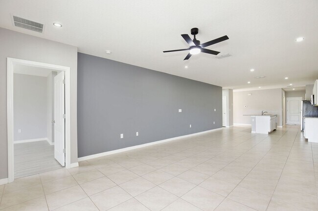 Building Photo - Move-In Ready 2BR/2BA Villa with Den + 2-Car Garage | Lake Nona Adjacent | Suncrest at St. Cloud