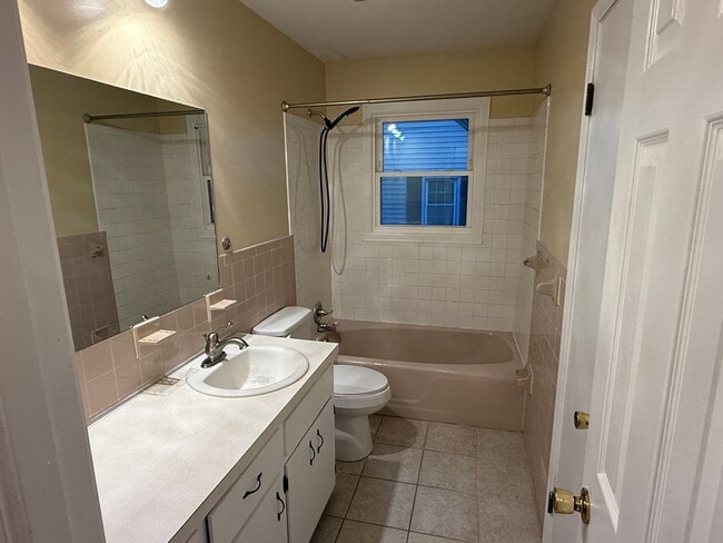 Building Photo - Updated 4BR Home with Finished Basement & Level Yard