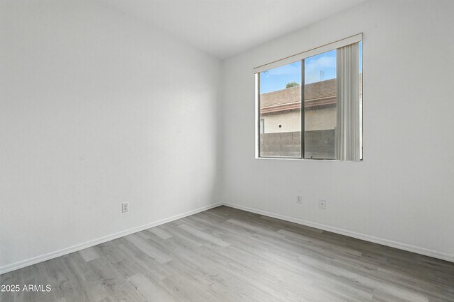 Building Photo - 8815 N 66th Ave