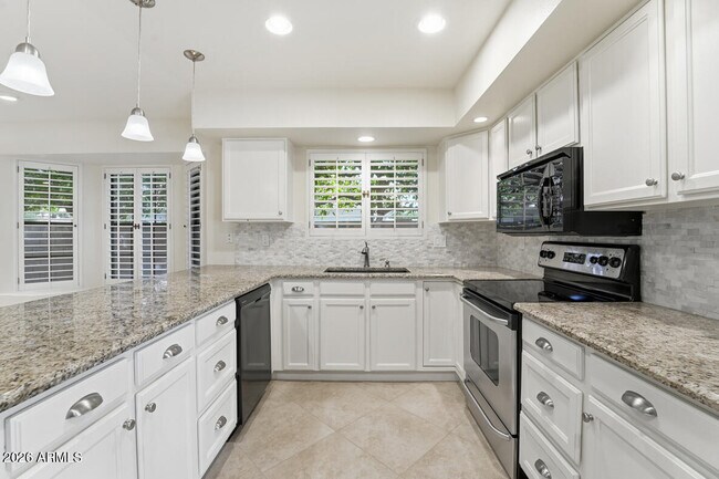 Building Photo - 5720 E Le Marche Ave