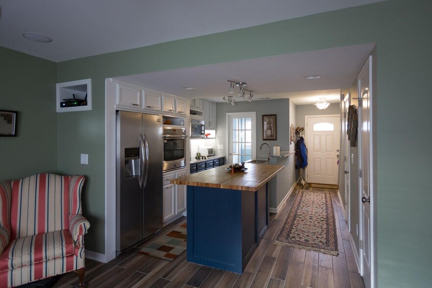 View from living room to entry and kitchen - 3000 Golden Rd