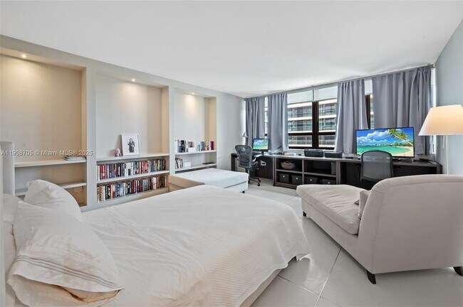 Building Photo - 10205 Collins Ave