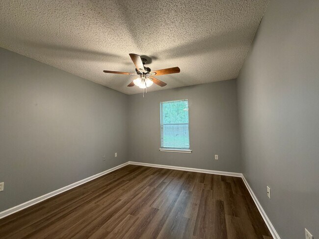 Building Photo - COMING SOON - Secret Harbor Three Bedroom Home