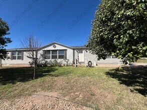 Building Photo - Spacious 3 bedrooms 2 baths home- Storage ...