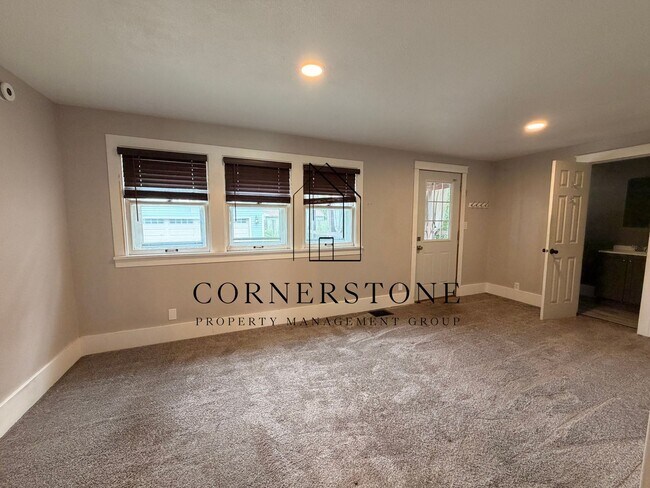 Building Photo - 4 Bedroom 2 Bathroom Home with Great Back Deck! $1300