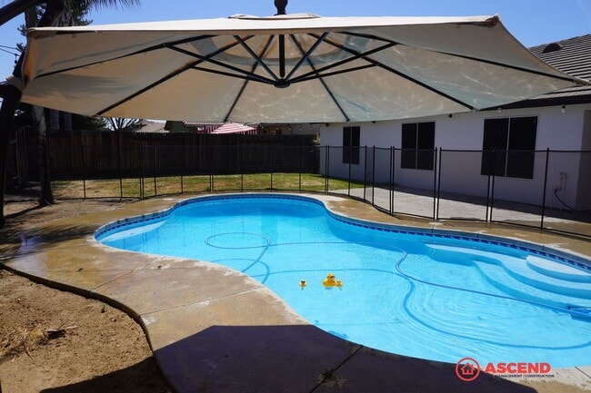 Building Photo - Beautiful 3 Bedroom + Office Home with a Pool!