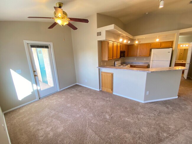 Building Photo - Charming 2 Bed/2Bath Condo nestled in this beautiful Green Valley Community! — Enjoy Rent-Free Ho...