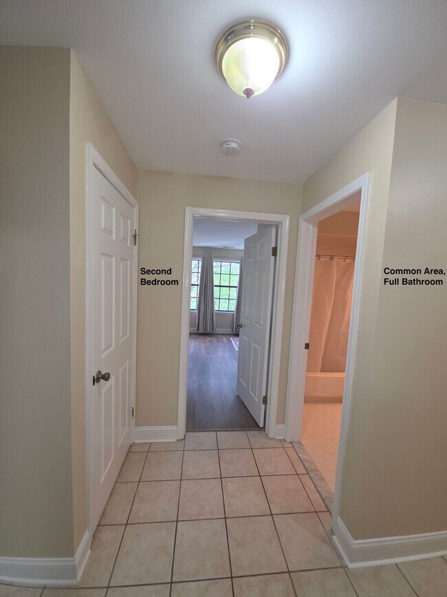 Building Photo - Rare opportunity! Furnished 2nd fl condominium boasting 2 large bedrooms, 2 full bathrooms, forma...