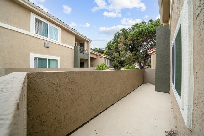 Building Photo - 7565 Charmant Dr
