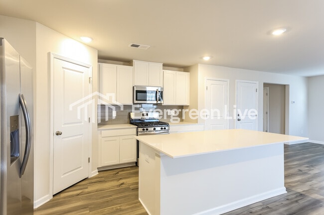 Building Photo - now