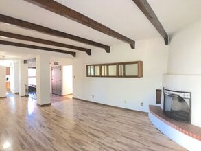 Building Photo - Spacious 2BR/2BA located on Golf Course in Rio Communities. Hardwood floors in living space. 2 Ca...