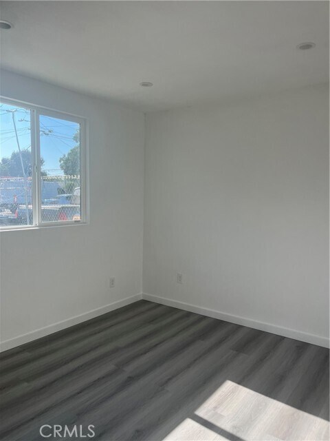Building Photo - 1387 W Holt Ave