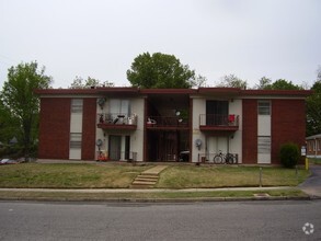 Building Photo - The Courtyard at The Flats