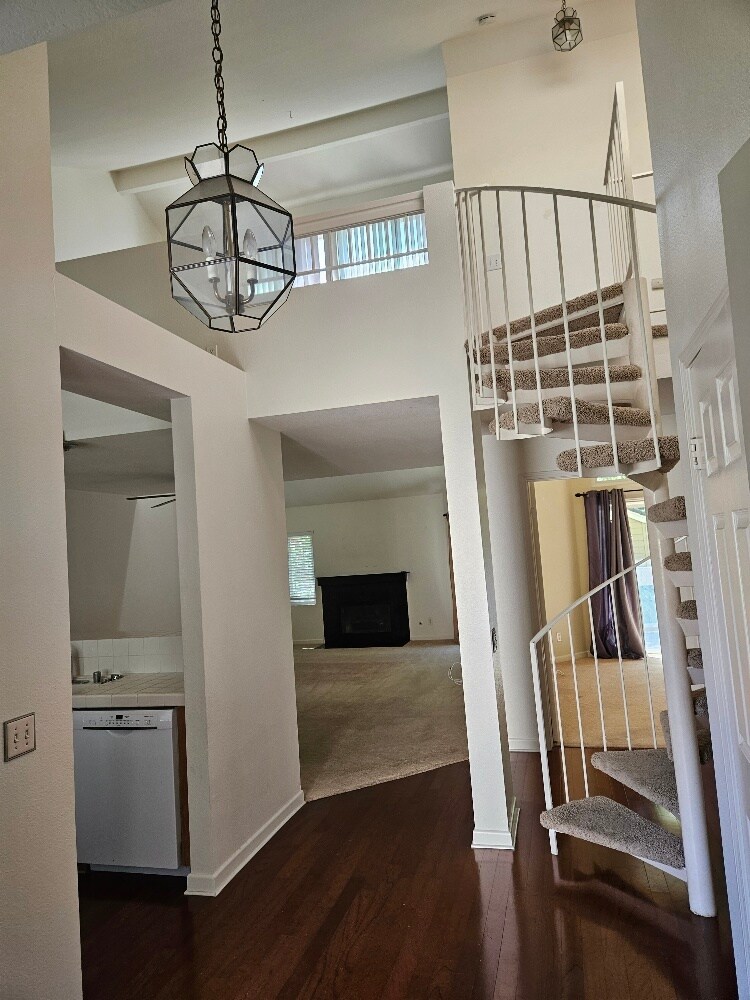 from entry spiral stairway to loft to loft - 7532 Seaspring Dr